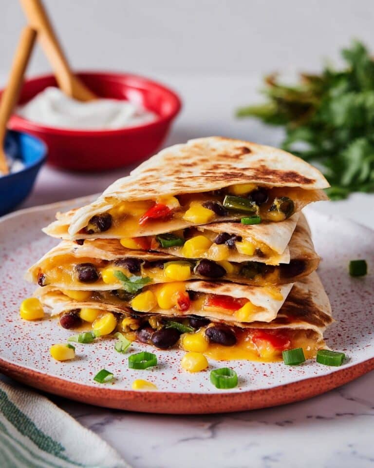 Cheddar and Monterey Jack Quesadilla with Black Beans, Red Bell Pepper, and Jalapeños Recipe